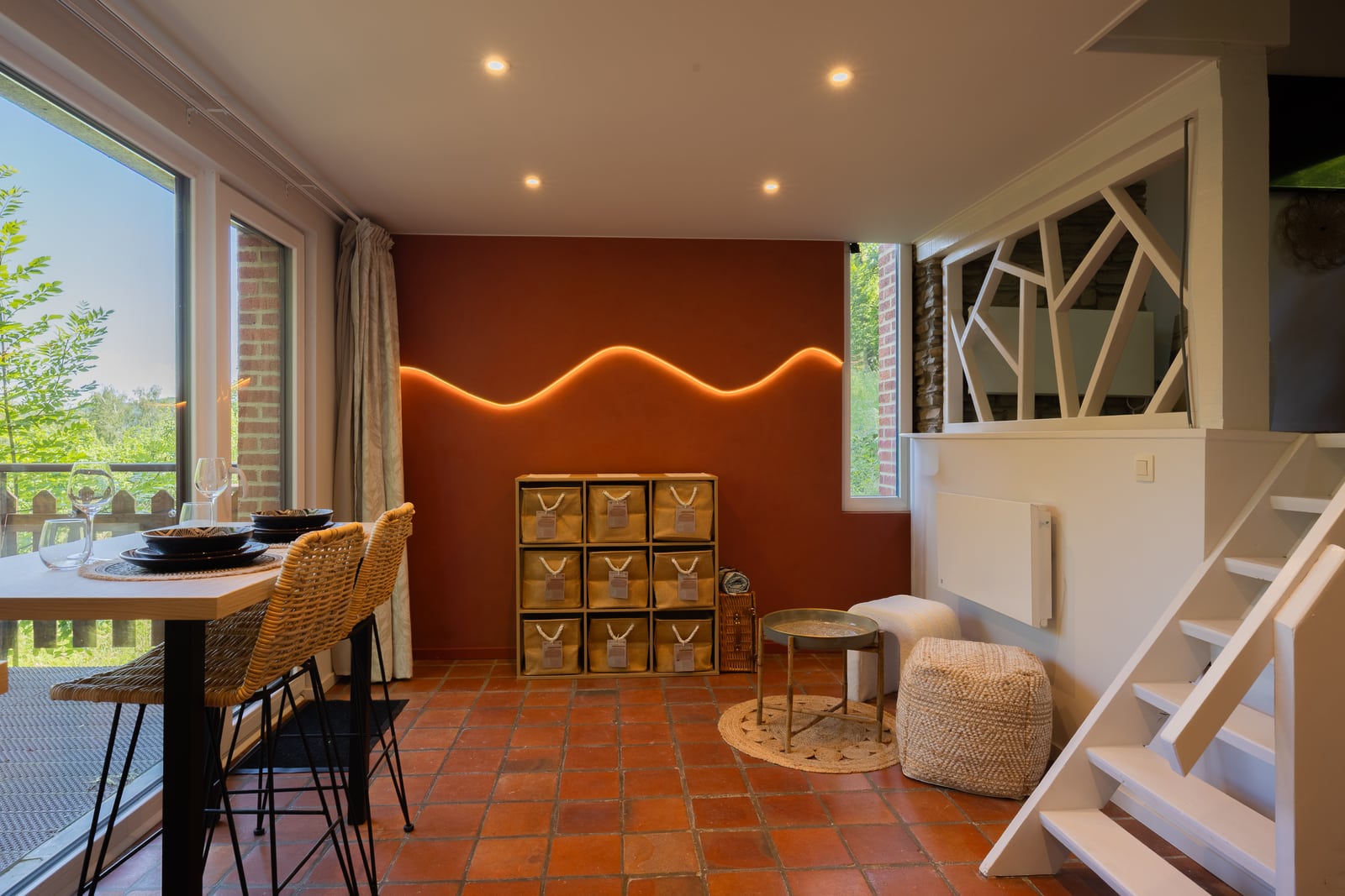 Terracotta dining room opening directly onto the terrace