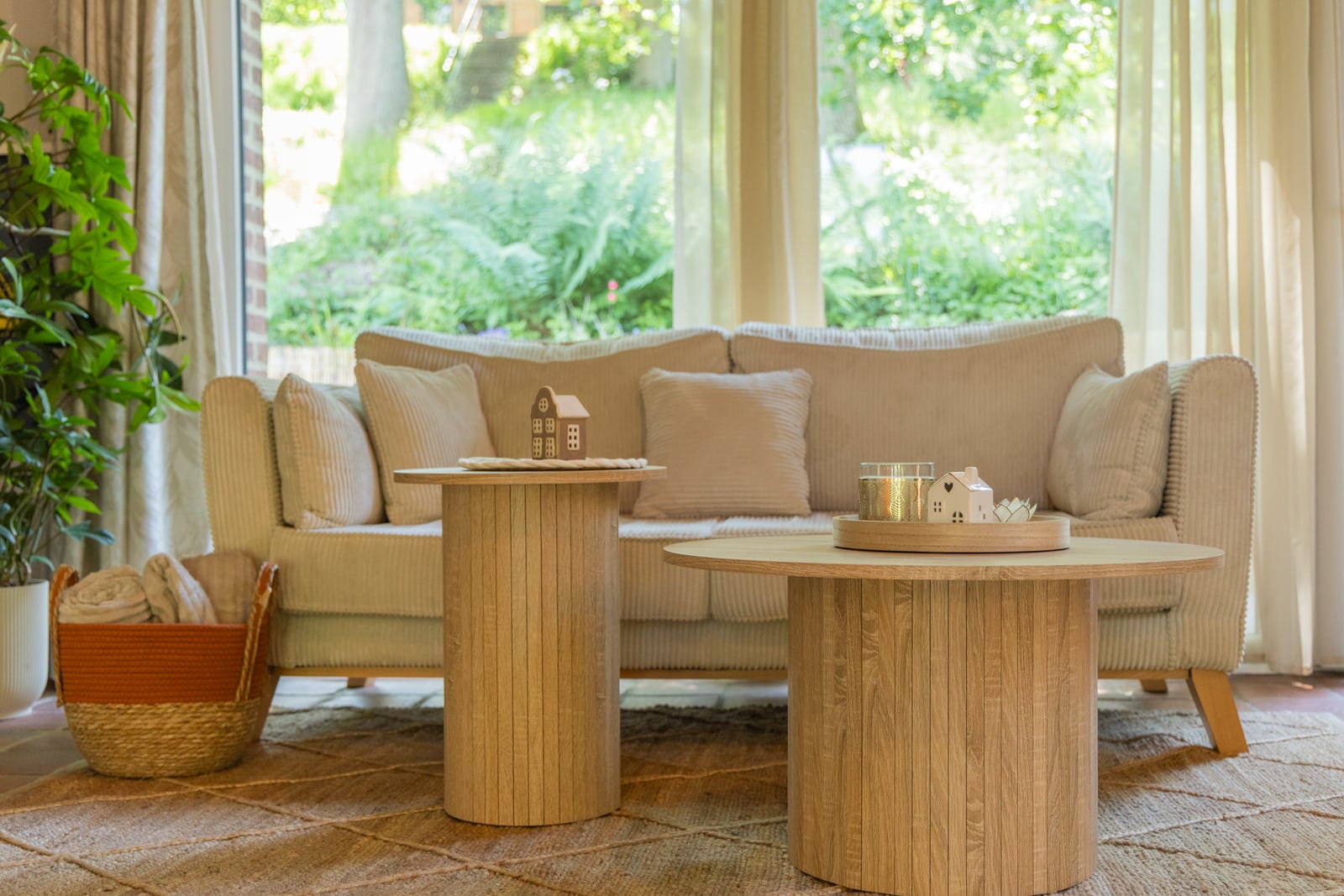 Wooden coffee tables in front of the living-room sofa